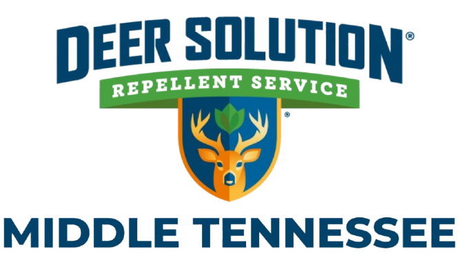 Deer Solution logo for Middle Tennessee deer repellent service, featuring a shield with a deer head and a tree, plus blue text.